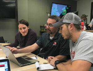 Baron Meteorologist briefs Team Rubicon team during Hurricane Florence.