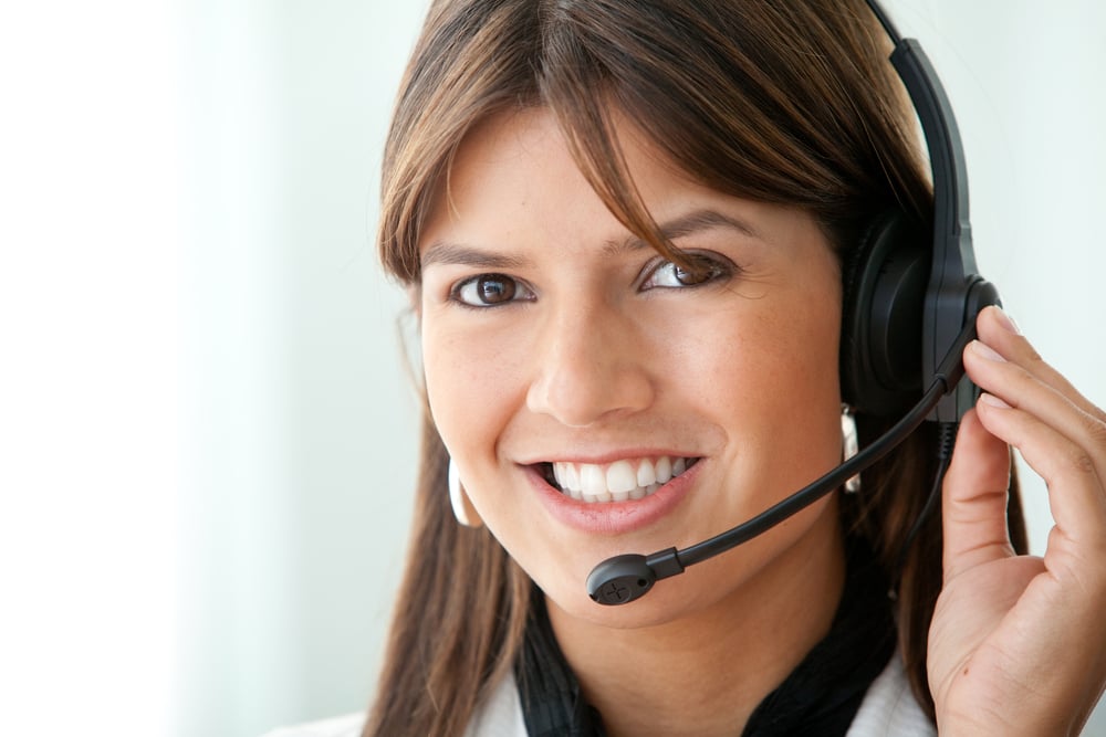 business customer support operator woman smiling in an office